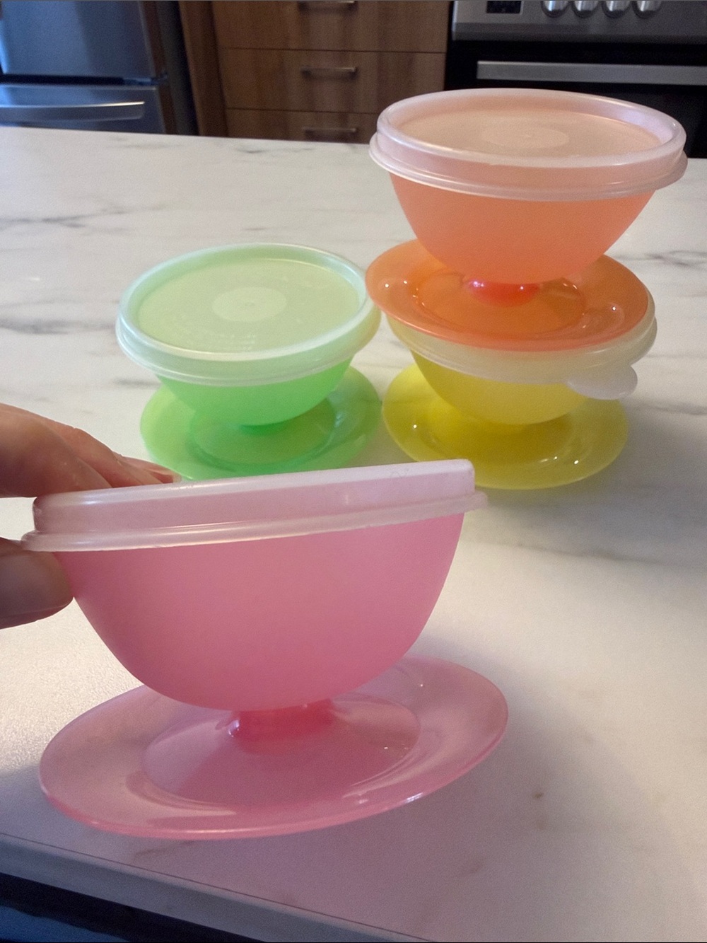 Tupperware Lots of 4 pudding cups in pastel color with lids